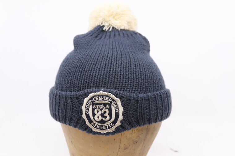 Fiebig knitted kindermuts met Pompom Navy en Beige